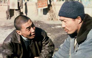 Tang (L) trying to convince Song (R)