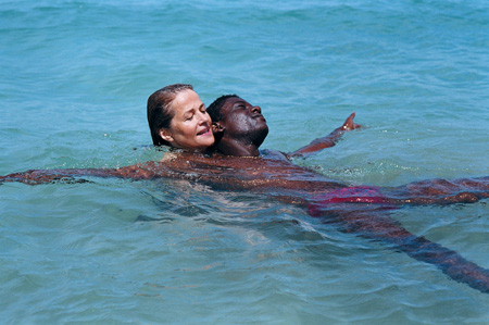 Ellen (Charlotte Rampling) teaches 
Legba (M�nothy Cesar) how to swim
Photo: Shadow Distribution