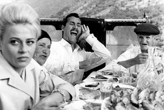 Marta (Norma Bengell), left, & Nino (Alberto Sordi), center, at the family reunion
in MAFIOSO
Photo: Rialto Pictures