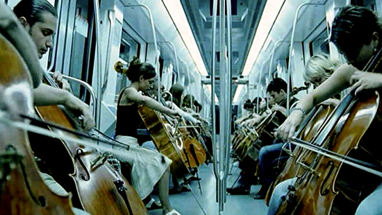 Cellists playing the first cello suite of Bach on a subway in Barcelona 
Photo: Films 59
