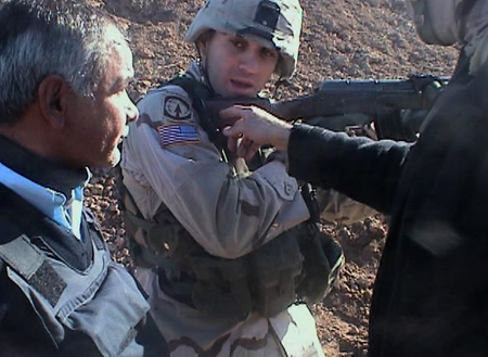 Sergeant Zack Bazzi training an
Iraqi policeman in THE WAR TAPES
Photo: SenArt Films & Scranton/Lacy Films